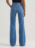 Back view of a woman wearing Wrangler Bespoke High Rise Trouser Jean in Bristol Wash, showcasing the vintage-inspired flare.