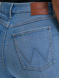 Close-up of Wrangler® Bespoke High Rise Trouser Jean showing the back pocket and leather logo in Bristol wash.