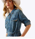 Ariat Women's Americana Snap-Front Denim Dress styled with a tie belt, perfect for warm weather and western chic.