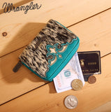 Wrangler Women's Genuine Hair-On Cowhide Zip-Around Wallet with cash and cards on wooden surface.