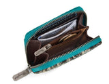 Wrangler Women's Genuine Hair-On Cowhide Zip-Around Wallet opened, showcasing unique textures and RFID protection.
