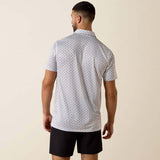 Back view of a man wearing Ariat Men's All Over Print Fitted Polo, showcasing its stylish design and fit.