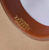 Stetson hat interior showing 100% pure fur felt and logo detail, showcasing quality craftsmanship.