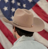Stetson Skyline 6X Fur Felt Cowboy Hat worn against an American flag backdrop, celebrating USA 250 Limited Edition.