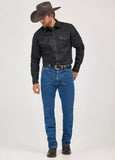 Man wearing Wrangler Men's George Strait Cowboy Cut Original Fit Jeans and a black shirt with a cowboy hat.