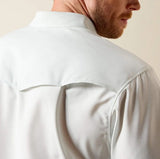 Back view of a man wearing an Ariat Men's Western VentTEK Classic Fit Shirt, showcasing its stylish collar and vented design.