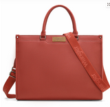 Wrangler Carry-All Tote Bag in Red with dual handles and detachable strap showcasing cow print side panels.