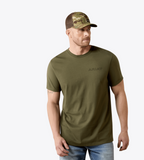 Ariat Men's green t-shirt displayed on a model wearing a camo hat, showcasing comfort and style, perfect for everyday wear.