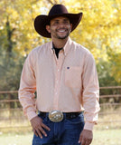 Cinch Men's Long Sleeve Floral Print Western Shirt in gold and gray, worn outdoors with a cowboy hat.