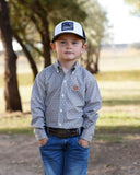 Cinch Boys Toddler Long Sleeve Geometric Print Western Shirt on a young boy outdoors in a stylish western setting.