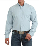 Cinch Men's Light Blue ArenaFlex Long Sleeve Shirt model wearing casual western outfit, showcasing comfort and style.