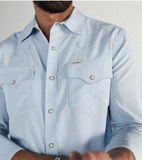 TECOVAS Men's Performance Western Shirt in Sky with dual chest pockets and snap buttons.