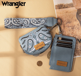 Wrangler Women's paisley RFID blocking card and coin pouch set with wrist strap and coins on a table.