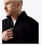 Ariat Men's Caldwell 1/4 Zip in Black, showcasing its stylish design and comfortable fit.