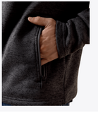Close-up of hand in pocket of Ariat Men's Caldwell 1/4 Zip in Iron Gate, showcasing style and functionality.