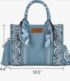 Wrangler Women's Paisley Print Tote Crossbody Bag in Desert Jean Paisley with embroidered details and whipstitch trim.