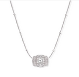 SpurWest Mini Belt Buckle Necklace featuring silver initial letters and intricate design on a delicate chain.