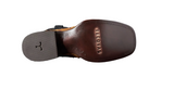 Bottom view of Tecovas The Emmitt cowboy boots showcasing the full-quill ostrich leather and square toe design.