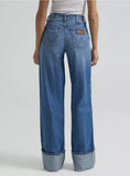 Back view of Wrangler Retro Women's Bailey Wide Leg Cuffed Jeans in medium wash, showcasing their vintage design.
