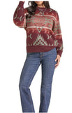 Panhandle Slim Women's Aztec Sweater featuring a bold pattern, styled with jeans for a comfortable western look.